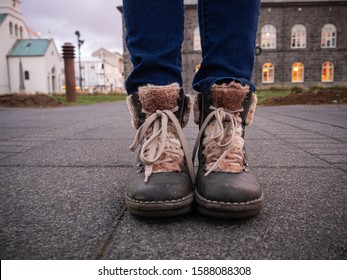 Cosy Girl Leather Boots On The Ground, In The Austurvöllur Public Square.
Reykjavik, Iceland.