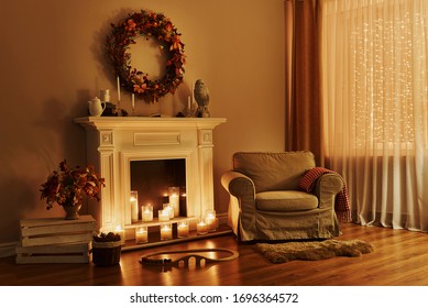 Cosy Living Room With Decor. Cozy Fireplace With Armchair. Interior In A Cozy House