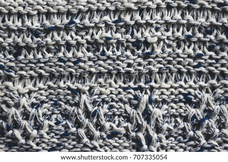 Cosy warm blue and white sweater close-up