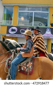 COTACACHI, ECUADOR - CIRCA JUNE 2016: Riders in the Paseo del Chagra, or horse parade