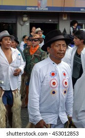 COTACACHI, ECUADOR - JUNE 25, 2016: Inti Raymi, The Quechua Solstice Celebration, With A History Of Violence In Cotacachi.  Men Stomp And Dance To Awaken Mother Earth.