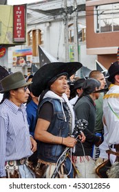 COTACACHI, ECUADOR - JUNE 25, 2016: Inti Raymi, The Quechua Solstice Celebration, With A History Of Violence In Cotacachi.  Men Stomp And Dance To Awaken Mother Earth.