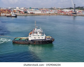 Cotonou, Benin - December 01: Tugboat in port Cotonou on December 01, 2020 in Cotonou, Benin.