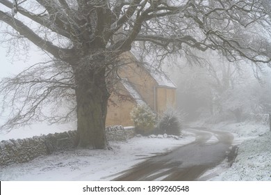 Cotswold Cottage In Snow, North Cotswolds, Gloucestershire, England.