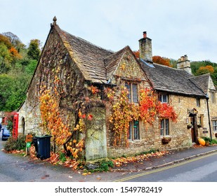 Cotswold village of Castle Combe in autumn, Ivy cottage Cotswolds 