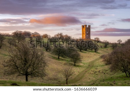 Cotswolds Broadway tower in worcestershire at sunrise on top of Broadway hill