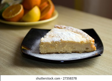 Cottage Cheese Cake On Black Plate.