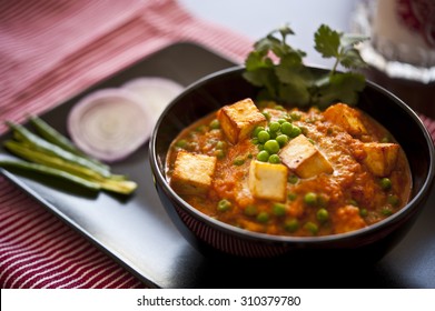 Cottage Cheese With Peas In Indian Gravy