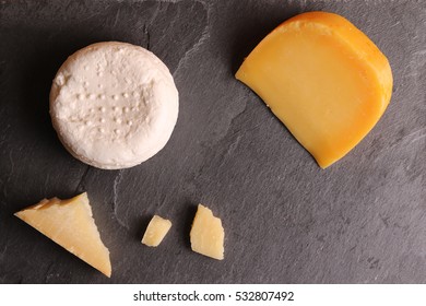 Cottage Cheese Quark Cheese Parmesan Gouda  On A Stone Slate Board. Top View 