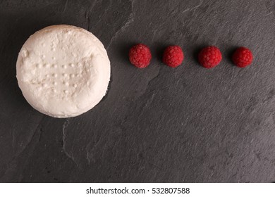 Cottage Cheese Quark Cheese With Raspberry On A Stone Slate Board. Top View