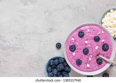 cottage cheese and yogurt smoothie bowl with fresh berries and chia seeds for healthy vegan vegetarian diet breakfast. top view - Shutterstock ID 1383157940