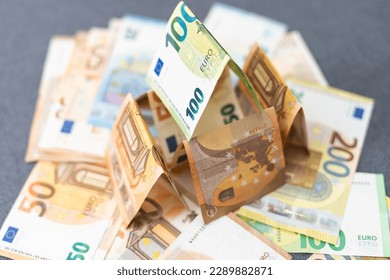 Cottage made of euro banknotes, housing loan.  - Powered by Shutterstock