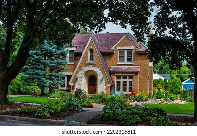 Cottage On Shady Street View. Cozy Cottage In Town. Cottage Exterior. Brick Cottage View