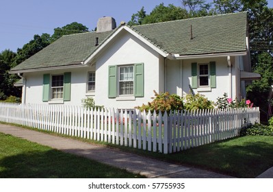 Cottage with Picket Fence