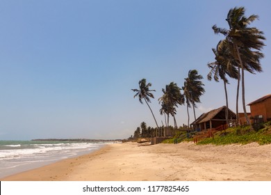 Cottages And Palm Trees On Sankofa Beach Ghana, Near Accra City