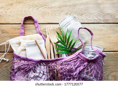 Cotton Bags, Net Bag With Reusable  Glass Jars, Bamboo And Wooden Cutlery. Zero Waste Concept. Eco Friendly. Flat Lay