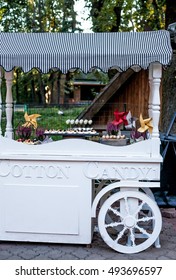 Cotton Candy Cart With Candy Bar Desserts And Delicious Sweets. Halloween Decor.