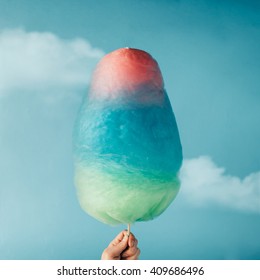 Cotton candy on sky background. Summer concept.
