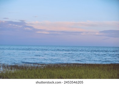 The cotton candy sky at the beach at sunset in Florida. - Powered by Shutterstock