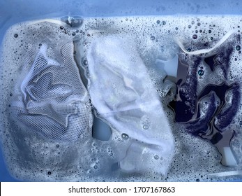 Cotton Cloth Mask Soak In Blue Tank After The Used And Washing,natural Glare Light,the Mask Repeated Use 2-3 Times,after Use Every Day Should Wash And Dry In The Sun To Be Sterilized As Well.