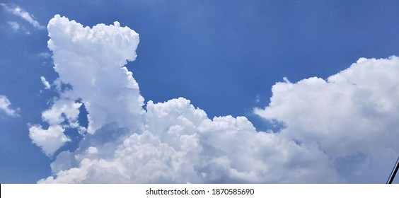 Cotton Clouds On Blue Sky