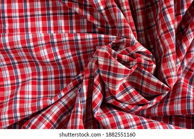 Cotton Red Tartan Fabric Texture. Crumpled