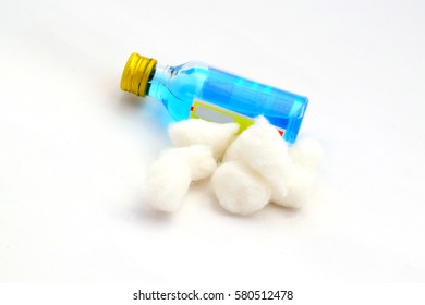 Cotton (selective Focus) And Isopropyl Alcohol Bottle.