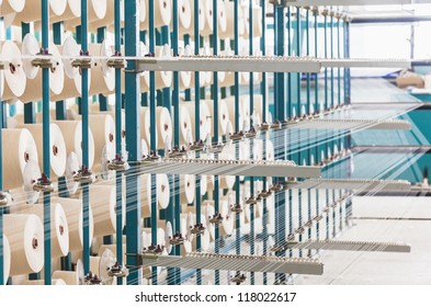 Cotton Threads Coming From Multiple Small Cotton Cones And Combined Together In A Yarn Factory