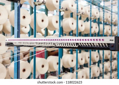 Cotton Threads Coming From Multiple Small Cotton Cones And Combined Together In A Yarn Factory