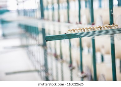 Cotton Threads Coming From Multiple Small Cotton Cones And Combined Together In A Yarn Factory