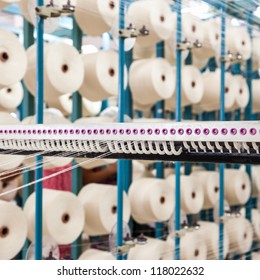 Cotton Threads Coming From Multiple Small Cotton Cones And Combined Together In A Yarn Factory