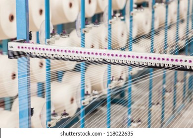 Cotton Threads Coming From Multiple Small Cotton Cones And Combined Together In A Yarn Factory