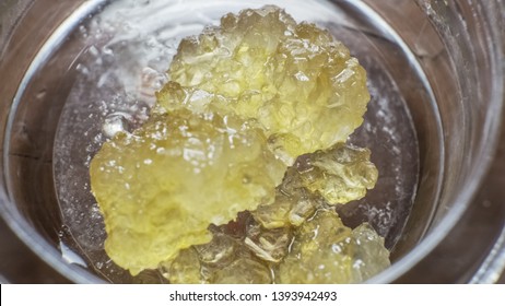 Cough Drops cannabis THCA crystals in terpene sauce, extracted by 710 Savant.