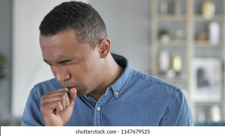 Cough, Portrait Of Sick Young African Man Coughing At Work