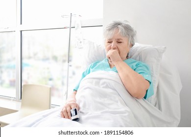 Coughing Elderly Woman In Hospital Room