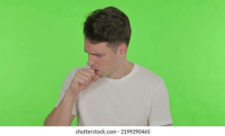 Coughing Young Man Feeling Unwell On Green Background