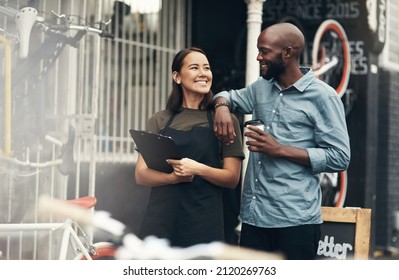 I couldnt have asked for a better teammate. Shot of two young business owners standing outside their bicycle shop during the day. - Powered by Shutterstock