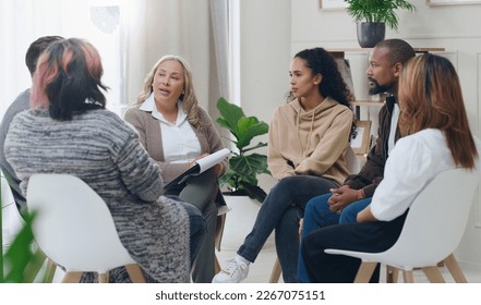 Counseling, group and psychology discussion with group of diversity people in therapy for depression, stress and anxiety. Men and women healing during psychologist meeting talking about mental health - Shutterstock ID 2267075151