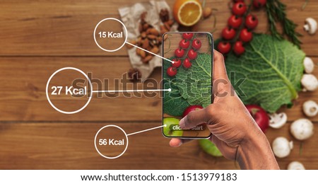 Count calories easily. African man holding cellphone and taking photo of food for healthy nutrition, panorama