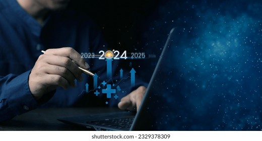 Countdown to 2024 concept. the taps a virtual download bar with a loading progress meter on New Year's Eve, turning the year 2023 to 2024.