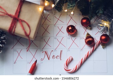 Countdown To Christmas With A Calendar, Wrapped Present And Decorations