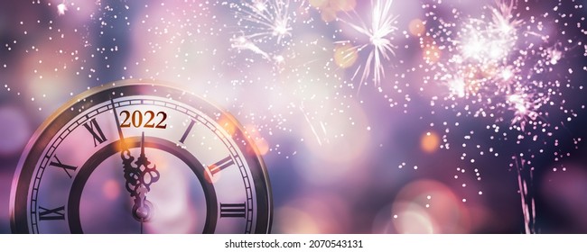 countdown clock 2022 at new years party night with firework explosion, abstract celebration concept with copy space for happy new year party with blurred lights on colorful background - Shutterstock ID 2070543131