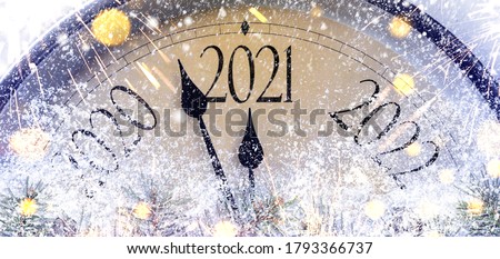 Countdown to midnight. Retro style clock counting last moments before Christmas or New Year 2021.