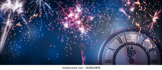 Countdown New Years Eve 2021 With Colorful Fireworks On Dark Blue Sky Background, Clock And Blurred Firecrackers  For Happy New Year Celebration, Explosion Light Effects 