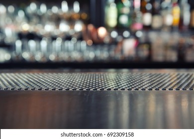 Counter Bar With Glass Background In Dark Tone