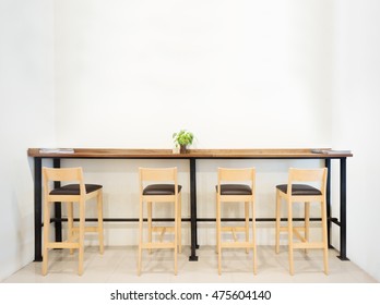 Counter in cafe bar with empty space white wall . 