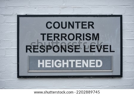 Counter terrorism sign showing current response level as heightened. These signs are on display near Military or Government buildings in England.