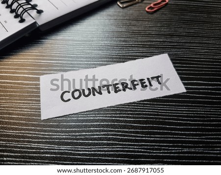 Counterfeit writting on table background.