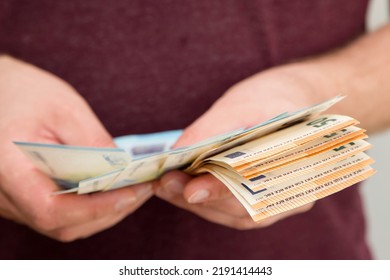 Counting Money For A Rent. Saving Money Concept. Finance, Business, Investment. Keeping Savings At Home. Spending Cash For Unexpected Expense, Unplanned Losses, Real Estate, Debts, Taxes.
