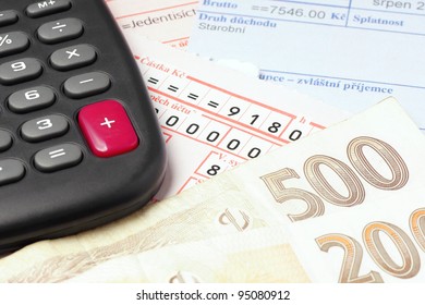 Counting and paying bills with Czech money.